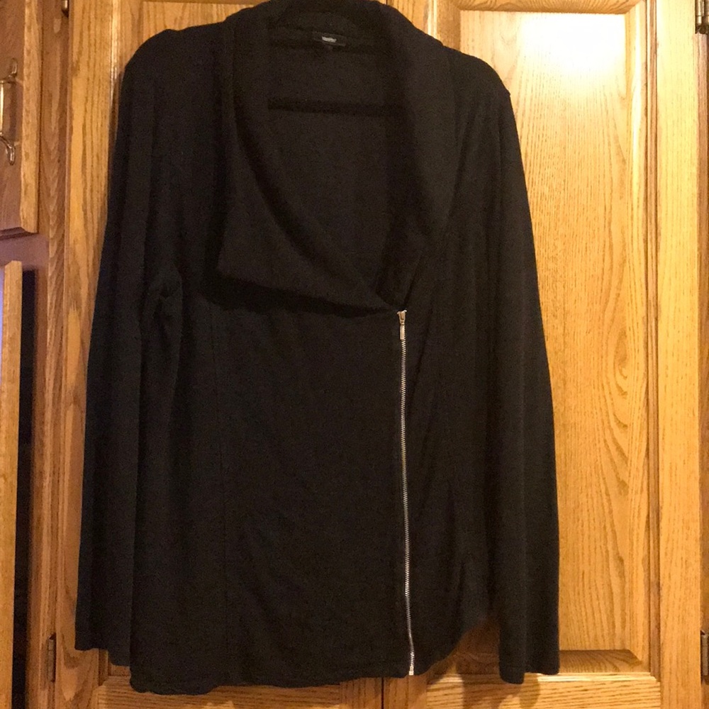 A symmetrical zip up jacket